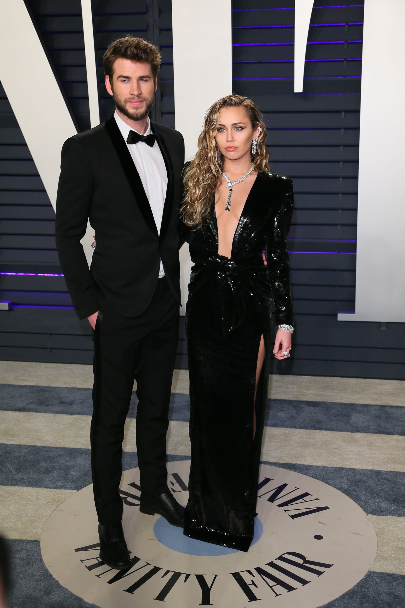 2019 Vanity Fair Oscars Party Miley Cyrus Liam Hemsworth Dress Suit Black