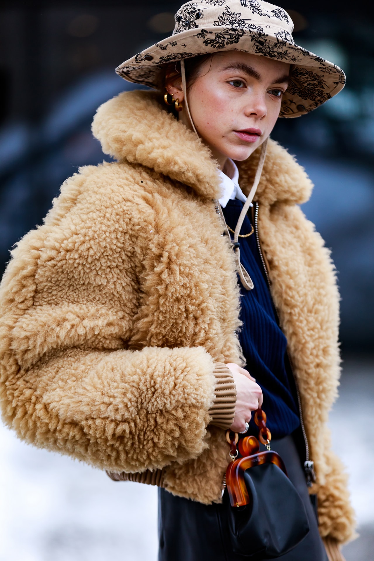 stockholm fashion week street style blogger influencer acne studios teddy jacket hat