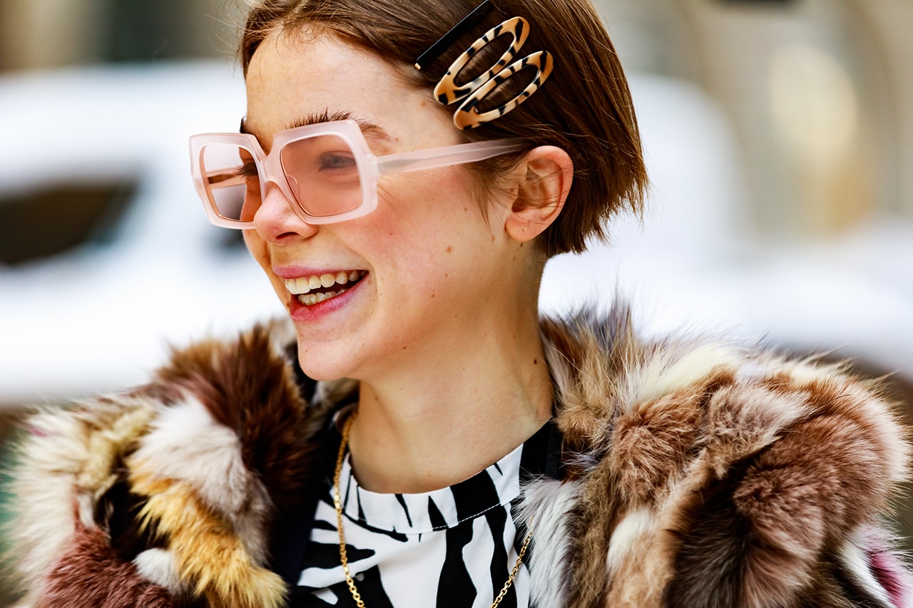 stockholm fashion week street style blogger influencer fur coat zebra print hair clips sunglasses