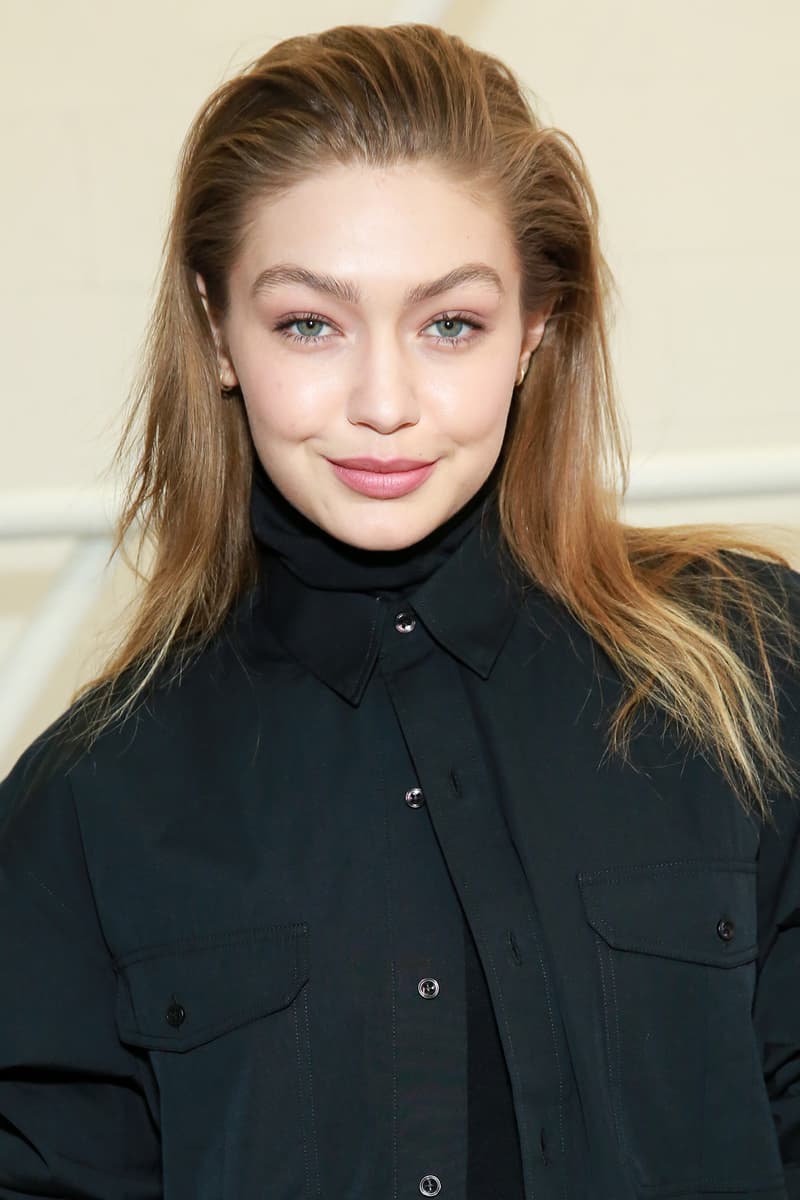 Gigi Hadid Wardrobe NYC Opening Black Shirt Turtleneck