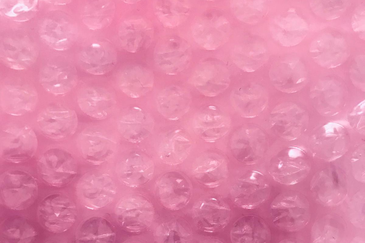 Glossier Pink Bubble Pouch Sustainable Packaging Option Bubblewrap