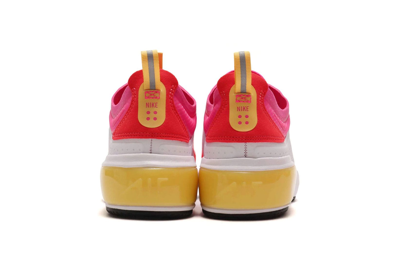 pink and yellow nikes