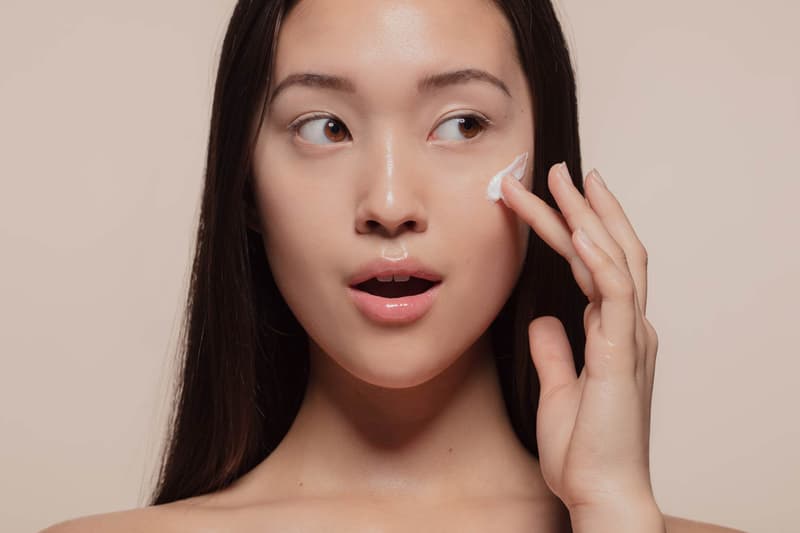 Woman Applying Skincare