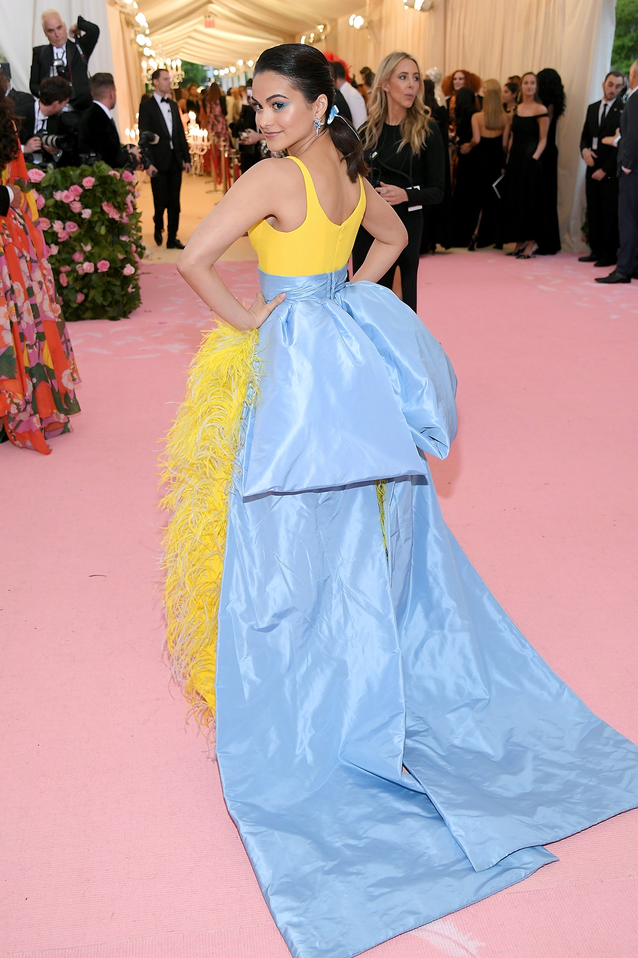 Camila Mendes Riverdale Actress Met Gala 2019 Red Carpet Camp Notes on Fashion Yellow Dress Blue Ribbon Back