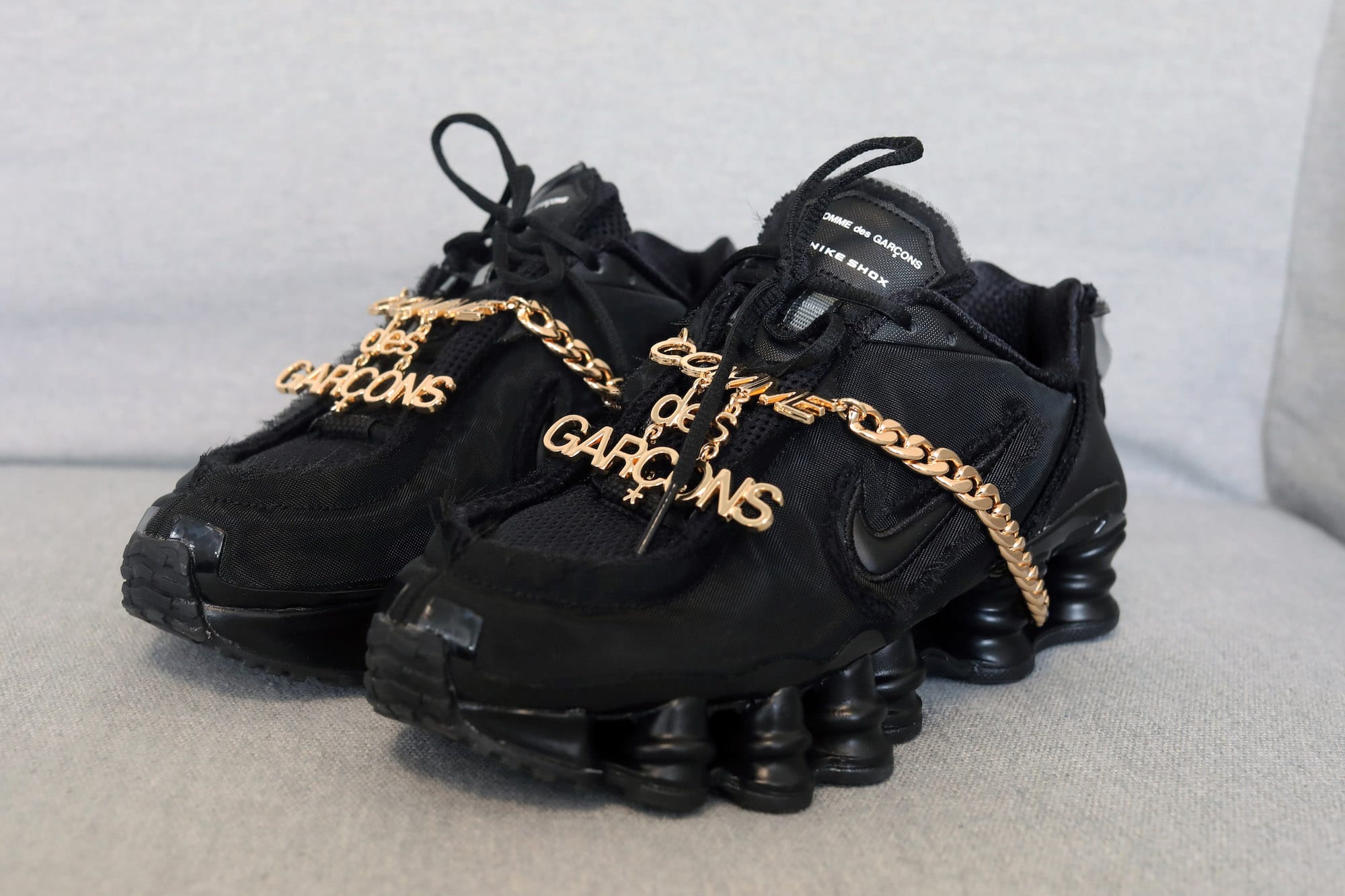 nike sneakers with chain