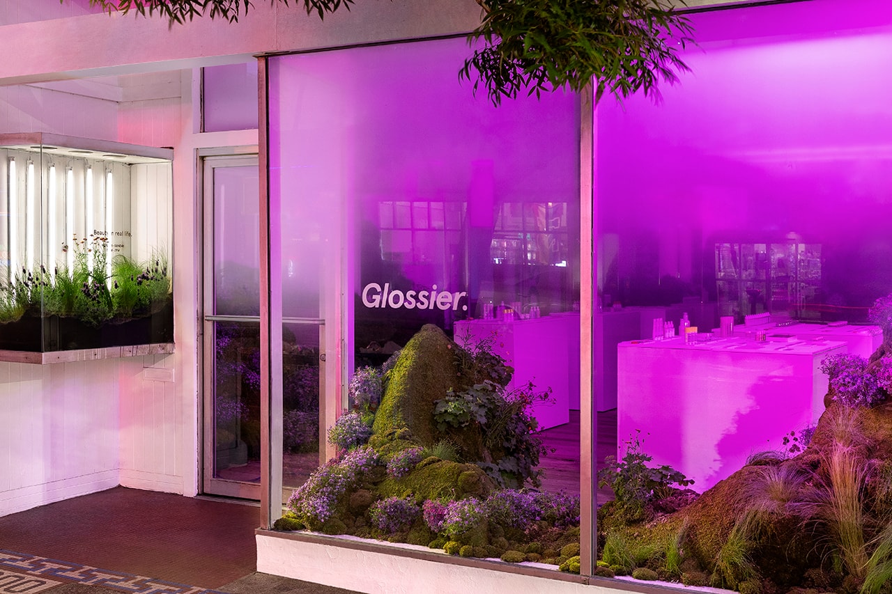 Glossier Seattle Pop-up Interior Makeup Skincare Beauty Emily Weiss Garden Grass Flowers Neon Pink Light