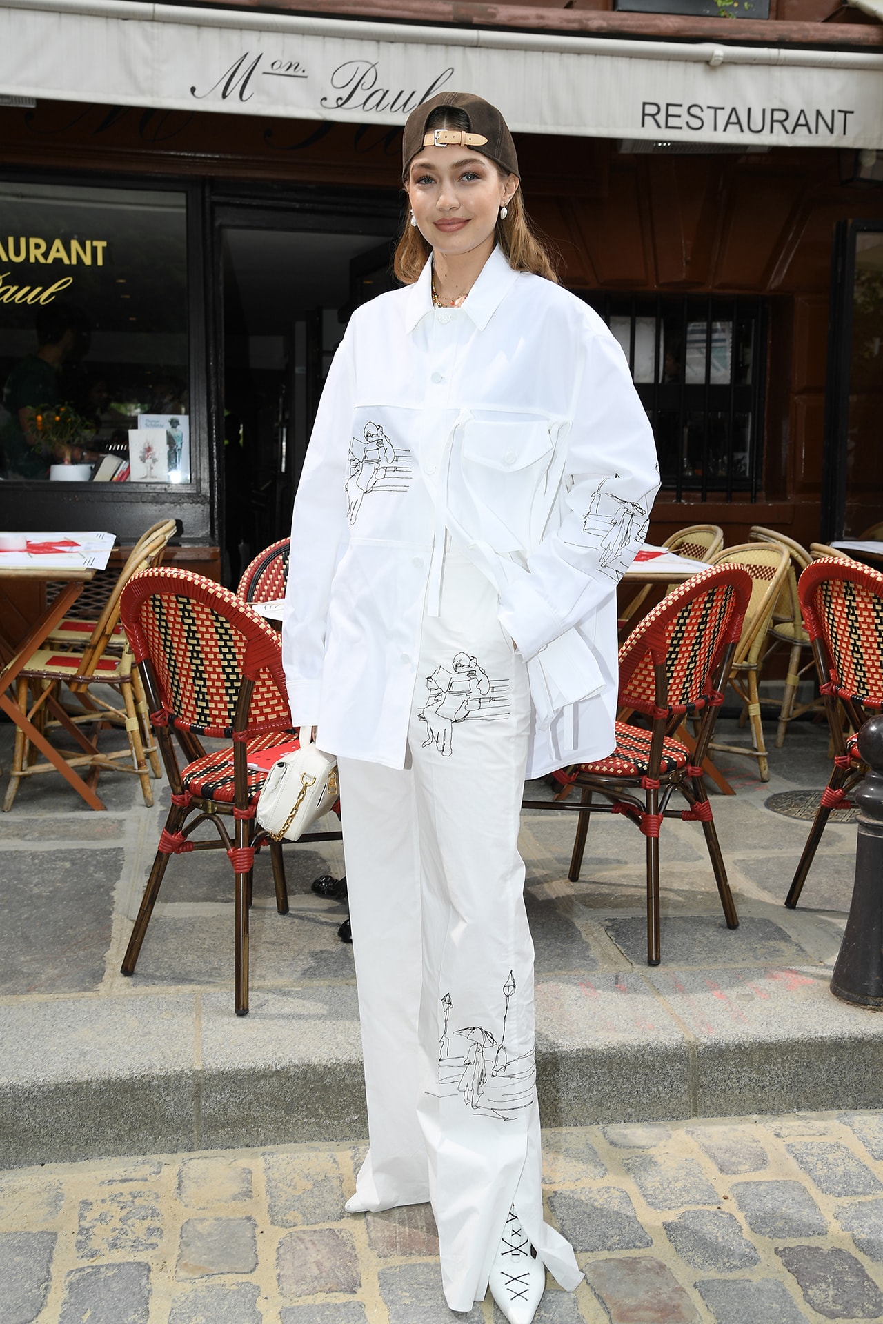 Gigi Hadid Louis Vuitton Menswear Spring Summer 2020 show Paris Fashion Week Men's 2019 Outfit Cap Hat White
