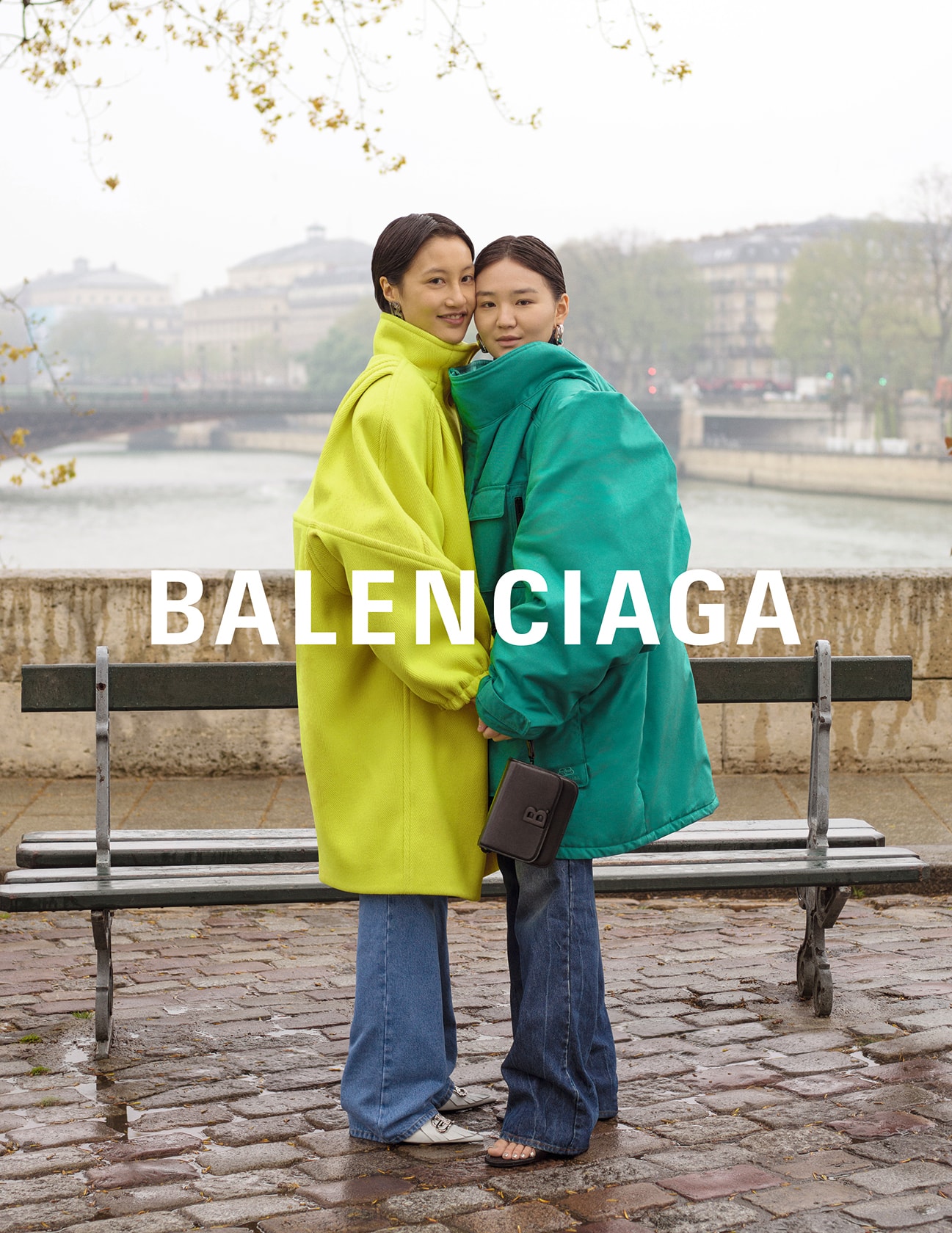 balenciaga winter campaign photos couple yellow coat teal jacket jeans
