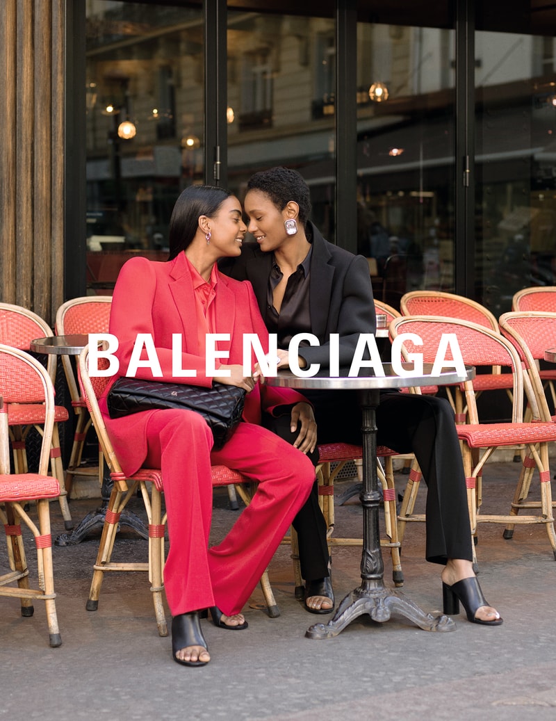 balenciaga winter campaign photos couple red blazer black suit powersuit