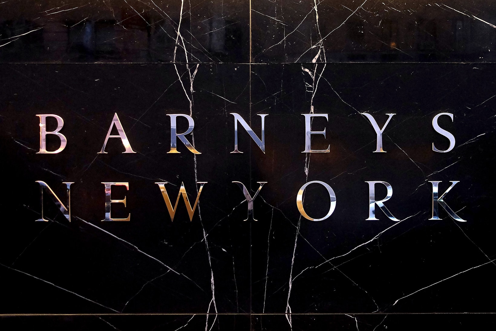 barneys new york city bankruptcy richard cayne perry madison avenue flagship retail debt businesses 