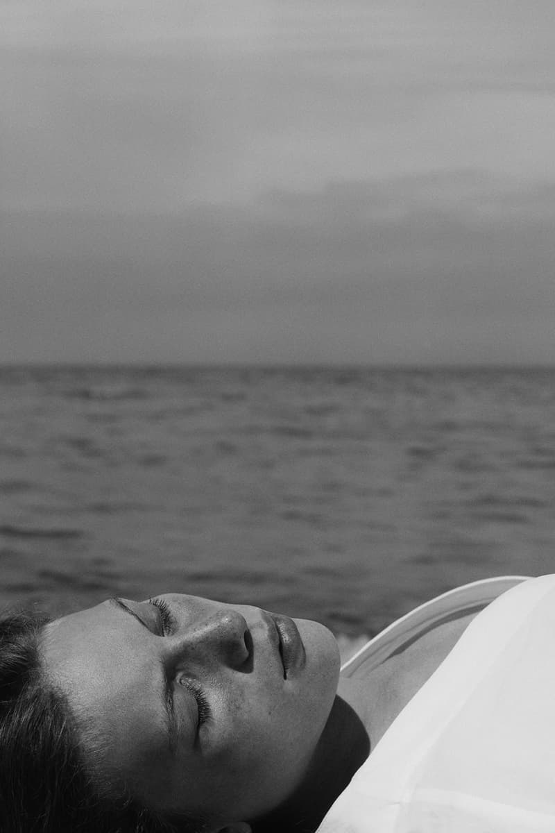 jil sander summer project capsule collection natural materials sustainable fashion clothes minimal dresses jumpsuits shirts hats sandals beach towel unisex footwear accessories