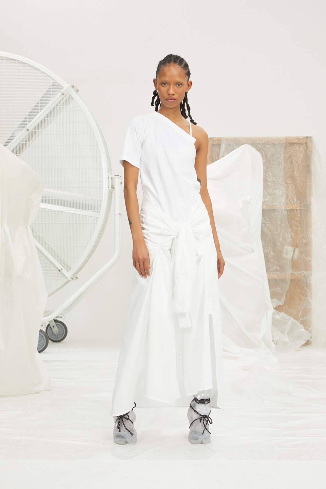 perfect number woman on pedastal Adesuwa Aighewi white shirt pants