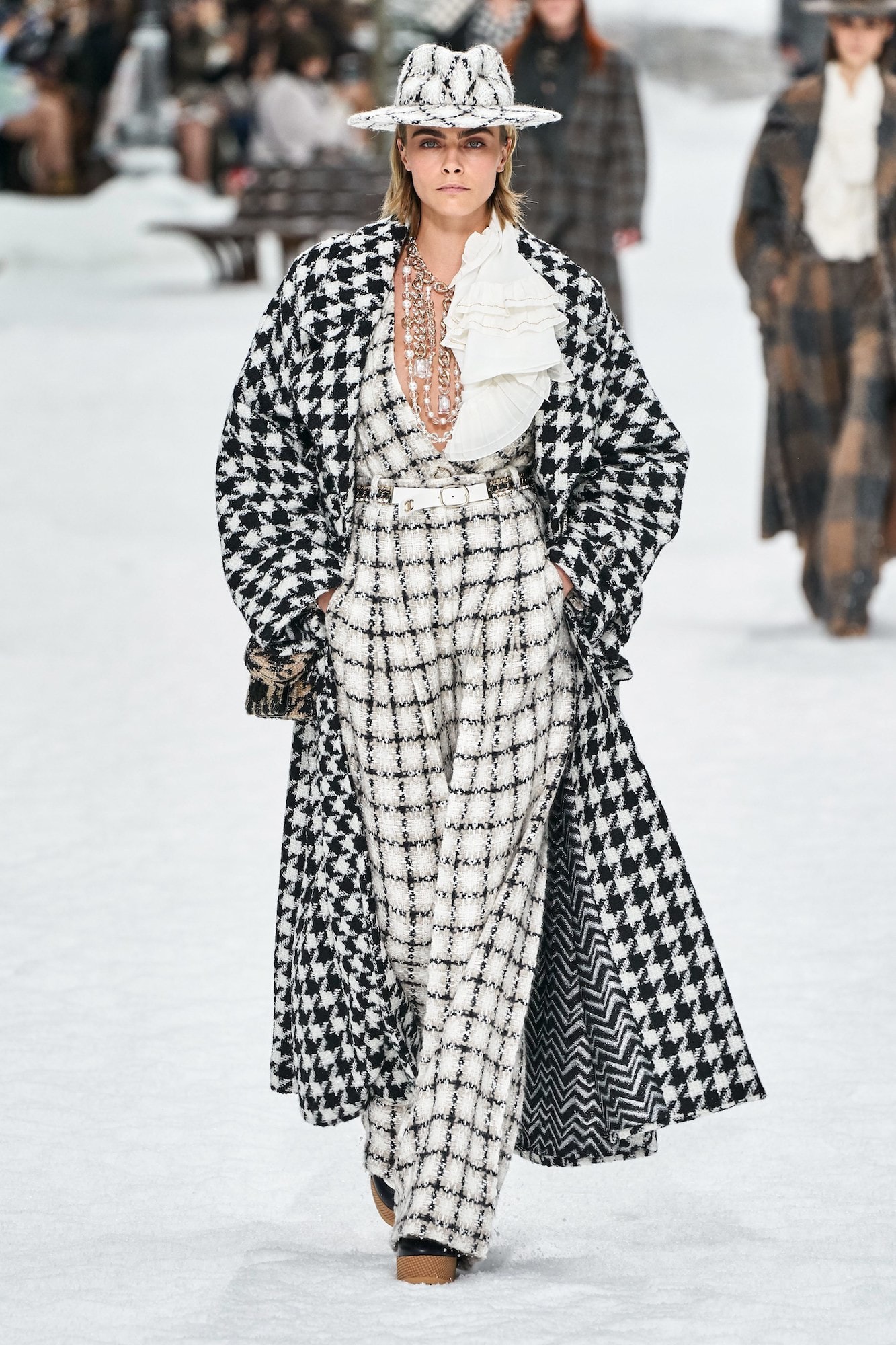 cara delevigne chanel runway fashion week houndstooth jacket coat silver accessories hat