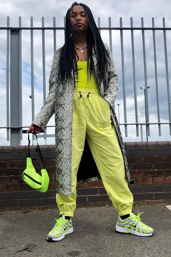 neon green tank top track pants fanny pack bum bag snakeprint jacket nike p-6000 sneakers bright vibrant outfit fashion style