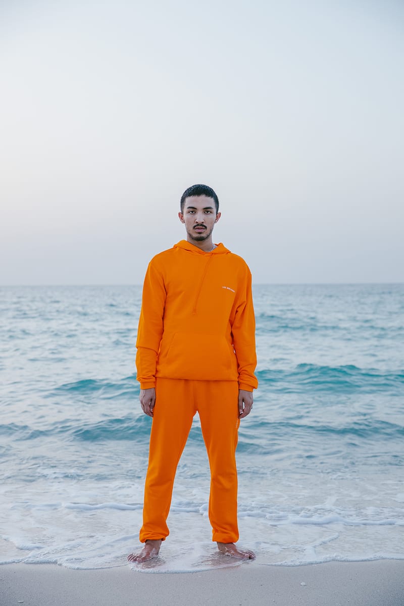 orange hoodie and sweatpants