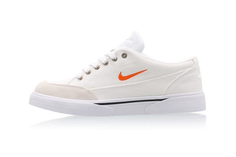 orange white nike shoes