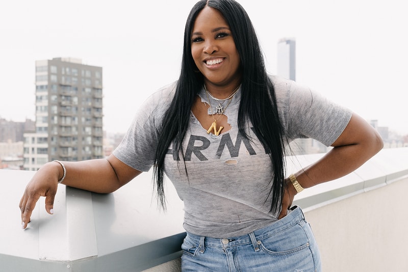 Nikki Nelms Celebrity Hairstylist New York Sister City Hotel Skyline Celine Phoebe Philo Alphabet Necklace Distressed Army Grey T-shirt Black Long Hair Jeans