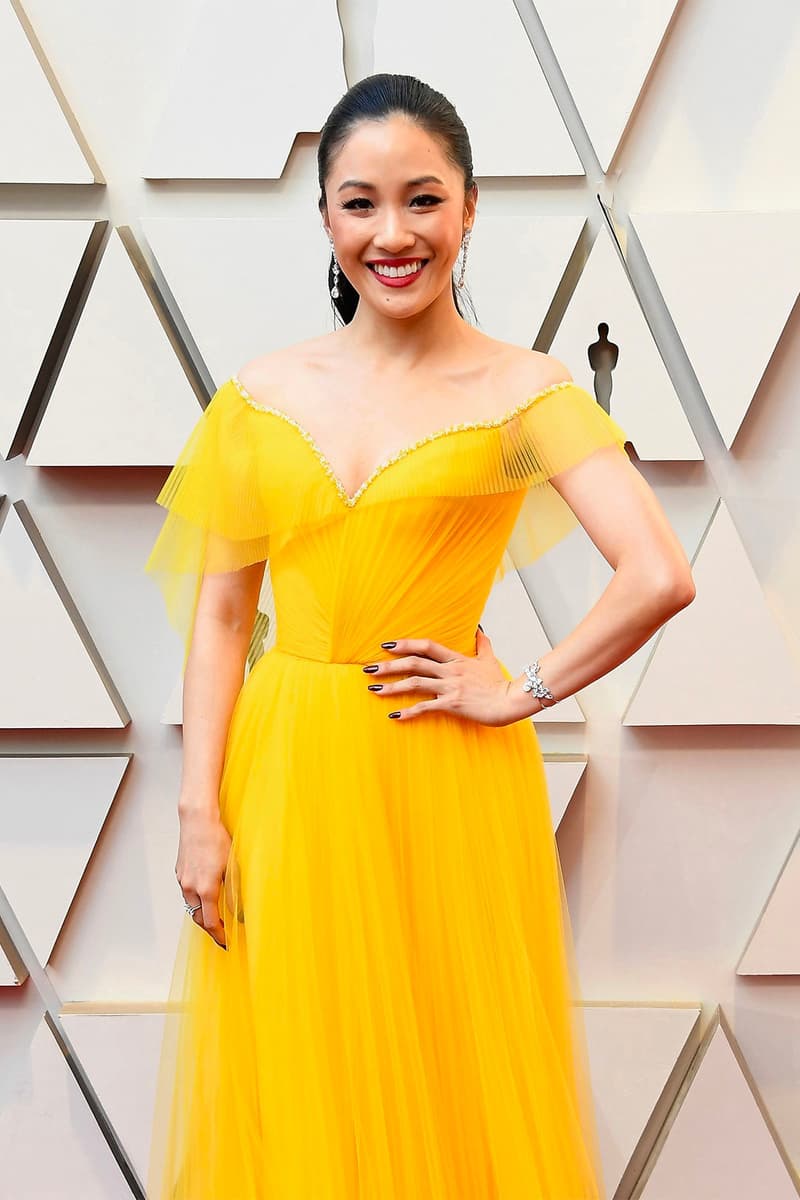 constance wu oscars actress yellow dress crazy rich asians red carpet makeup look