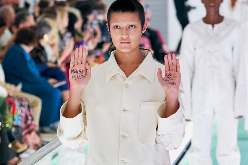 Gucci Model Stages Protest During Milan Fashion Week Catwalk: "Mental Health Is Not Fashion"