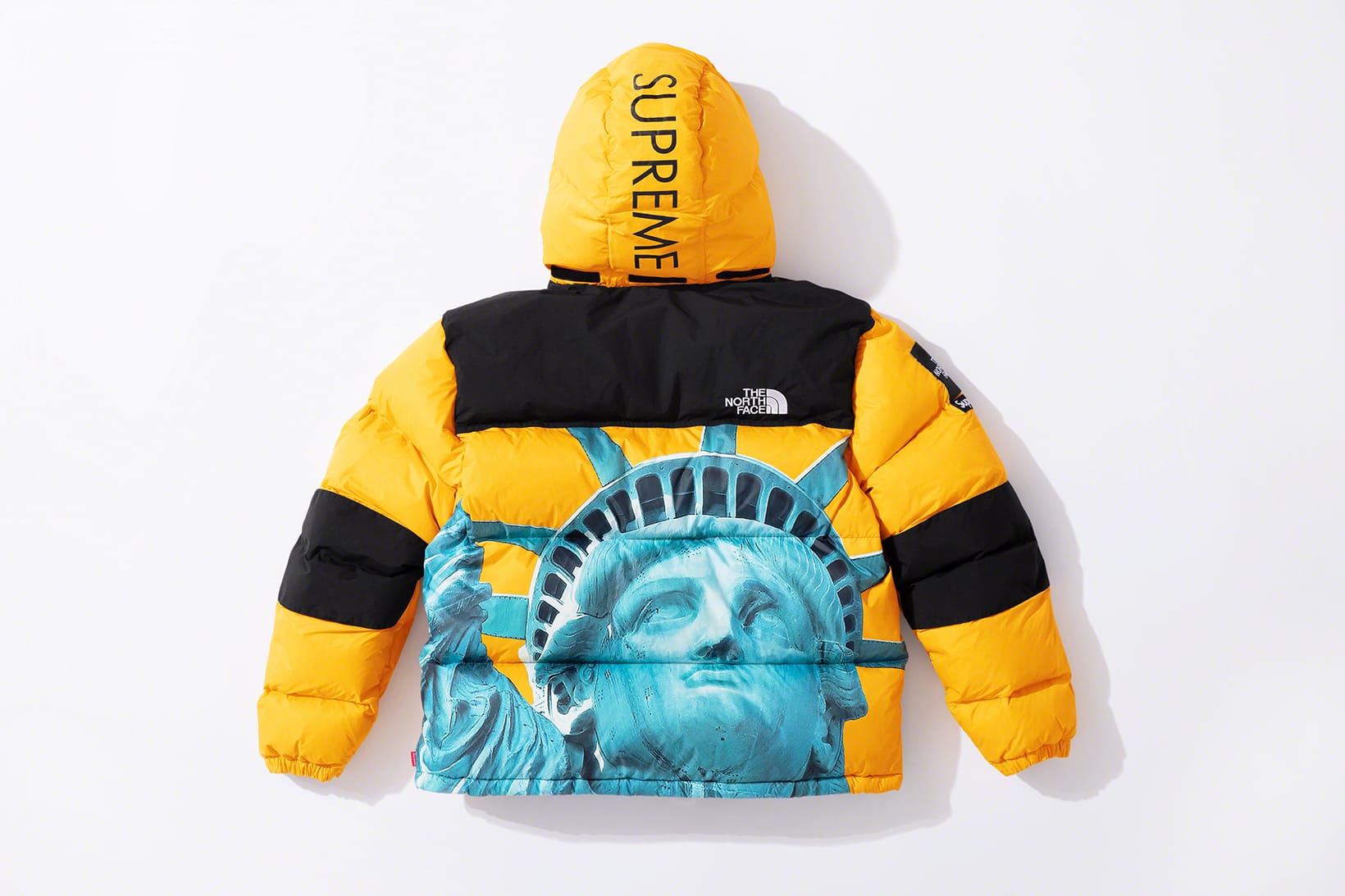 the north face supreme jacket yellow
