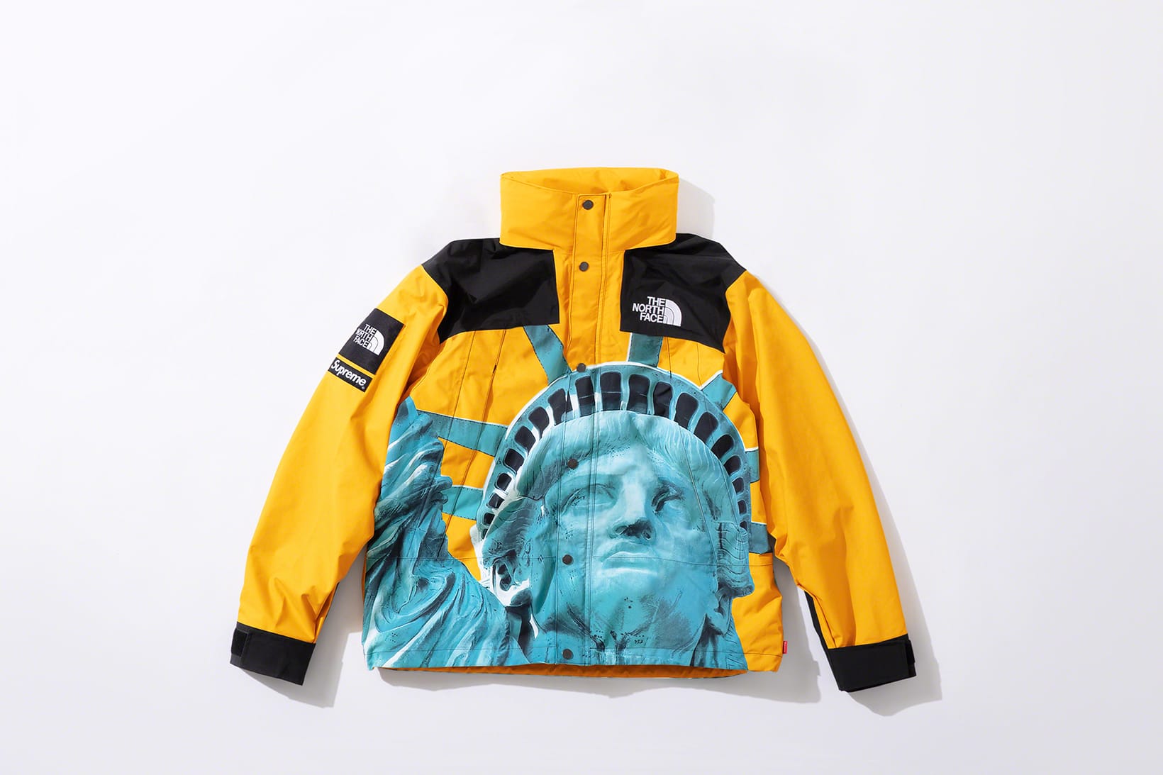 supreme x north face yellow jacket