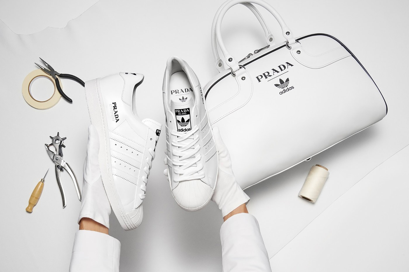 prada adidas originals collaboration superstar sneaker bowling bag white