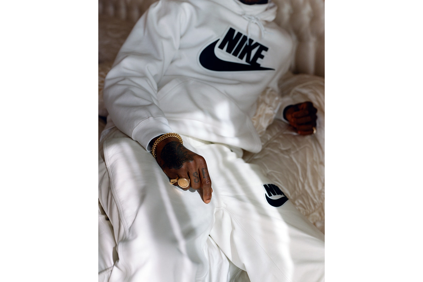 supreme nike collaboration white shirt cap shades jewelry gold ring