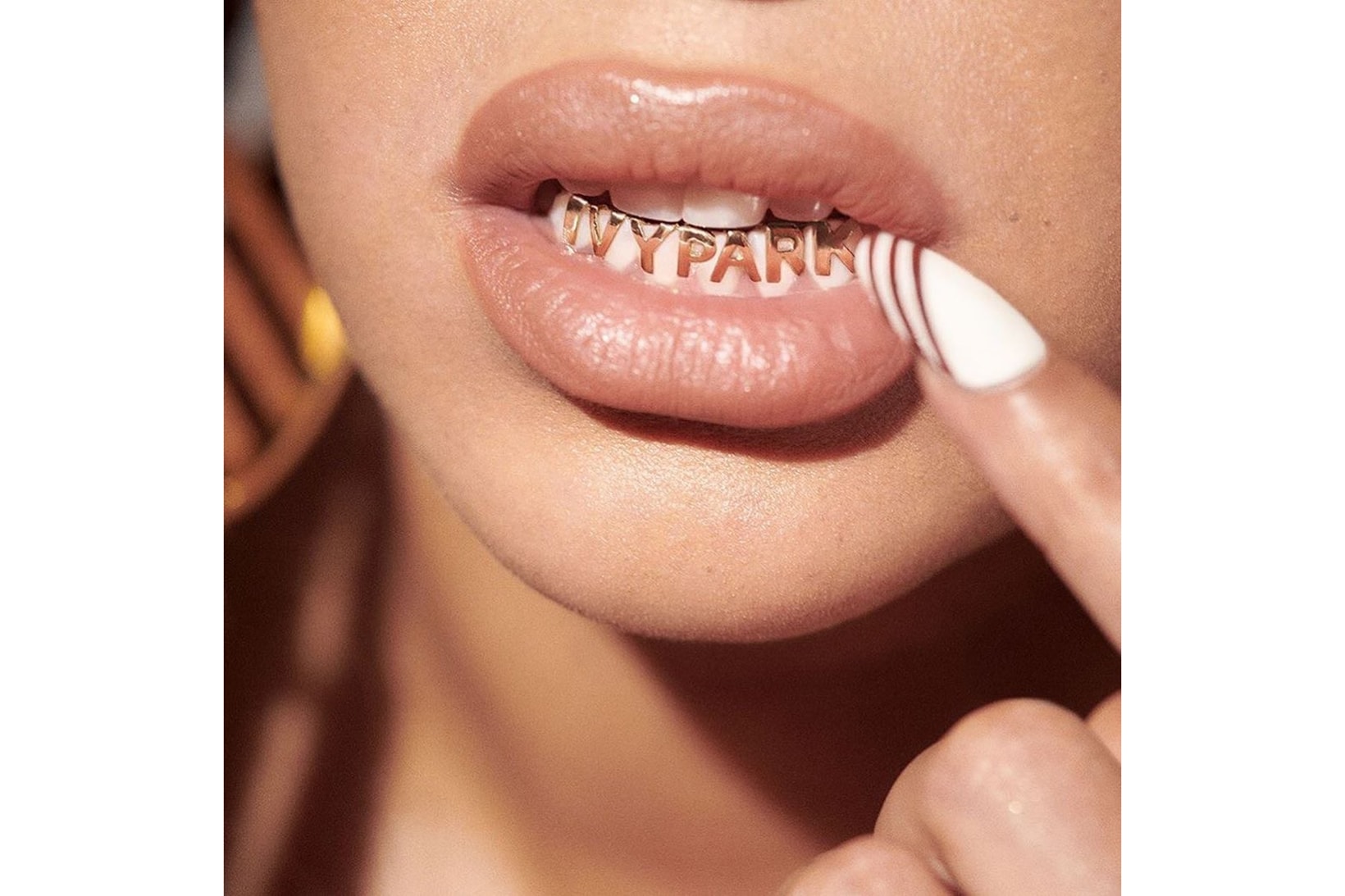 beyonce ivy park adidas collaboration grillz gold accessories