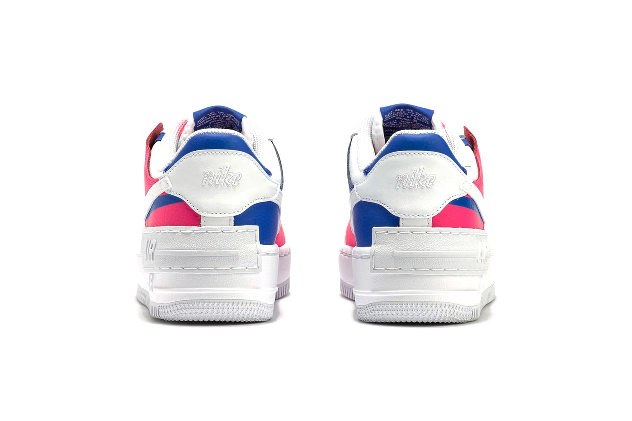 white blue and pink nikes