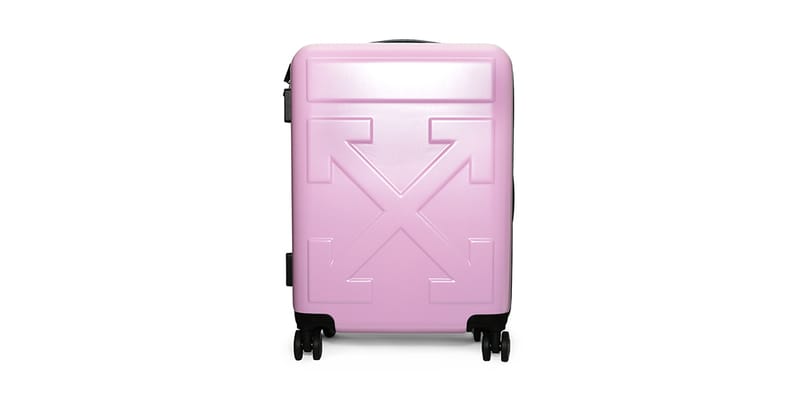 pink and white luggage