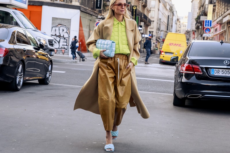paris couture week spring summer street style adut akech bottega veneta nike air jordan 1 mid melody ehsani collaboration snakers designer bags blazer jeans pants coats outwear shades sunglasses