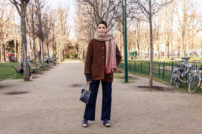 paris couture week spring summer street style adut akech bottega veneta nike air jordan 1 mid melody ehsani collaboration snakers designer bags blazer jeans pants coats outwear shades sunglasses