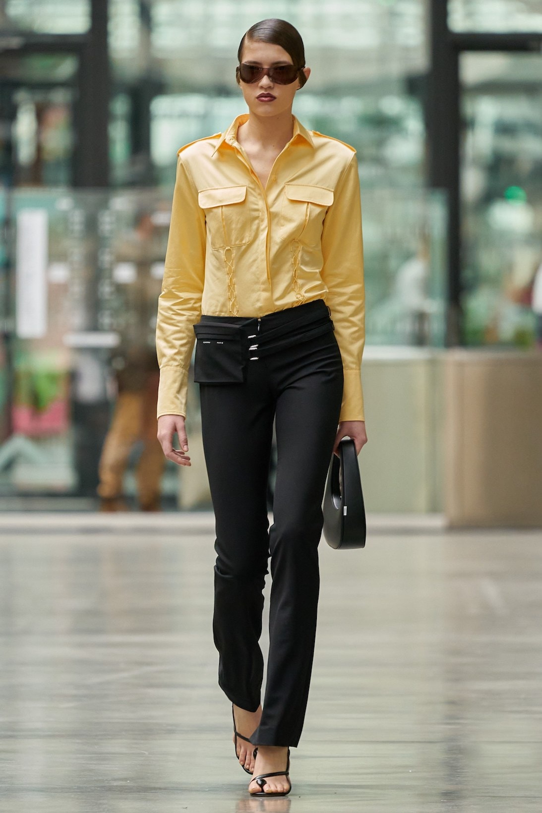 coperni sebastien meyer arnaud vaillant paris fashion week fall winter collection yellow long sleeve shirt black pants
