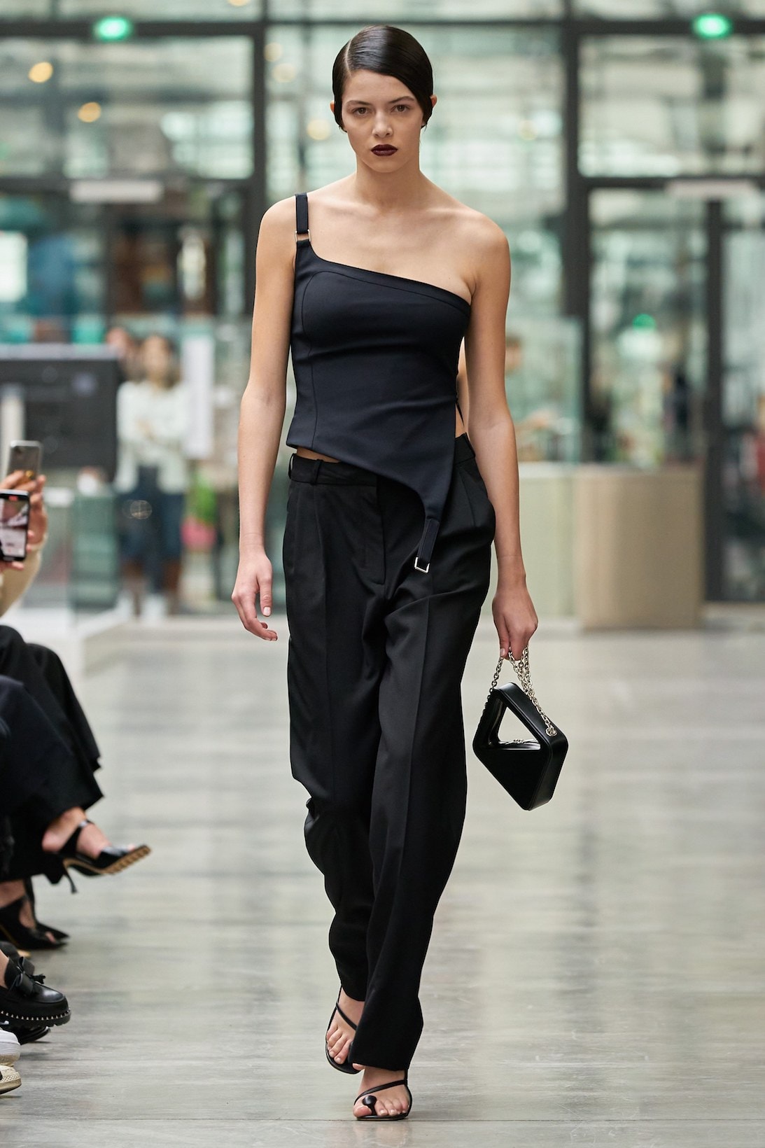 coperni sebastien meyer arnaud vaillant paris fashion week fall winter collection one shoulder top black pants bag
