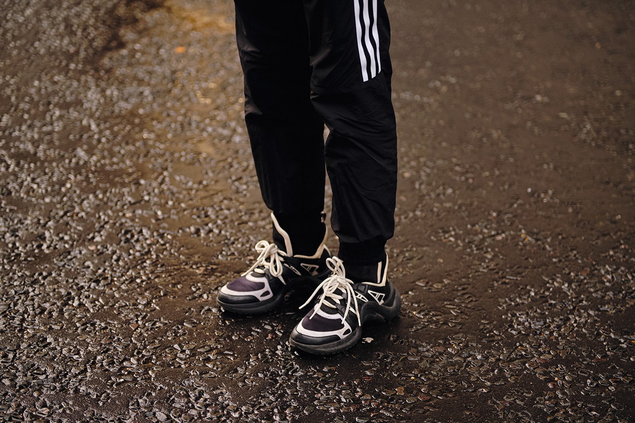 Street Style London Fashion Week Fall Winter 2020 louis vuitton archlight sneaker adidas trackpants