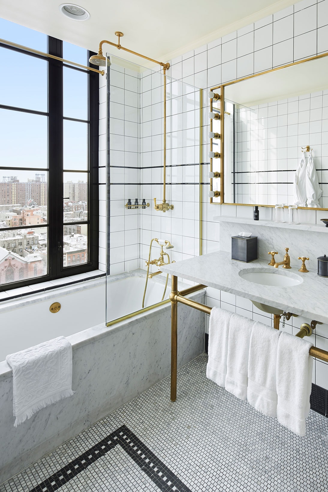 ludlow hotel bathroom new york city instagram nyc white walls gold view window
