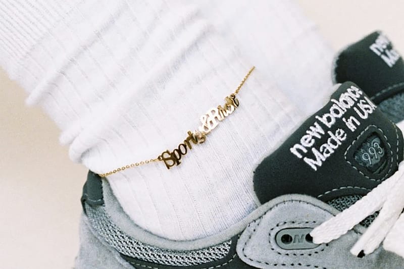 Emily Oberg's Sporty & Rich Drops a Dainty Gold Plated Logo Anklet