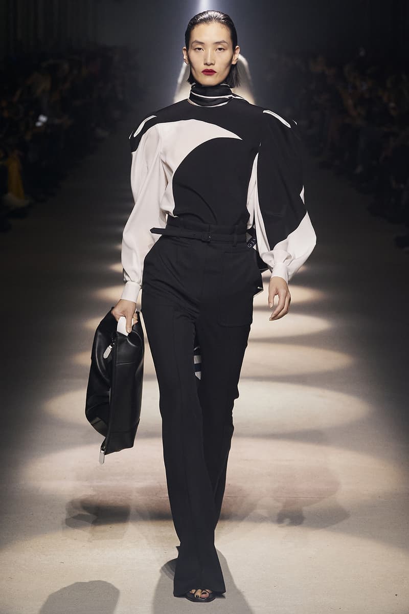 givenchy paris fashion week fall winter womens collection clare waight keller runway show kaia gerber adut akech red black white gown pants shirred blouse