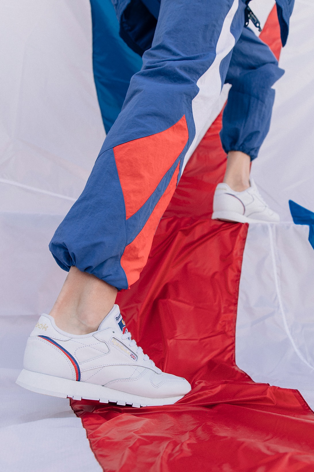 reebok international sports collection spring summer classic leather sneakers jackets shirts pants blue white red