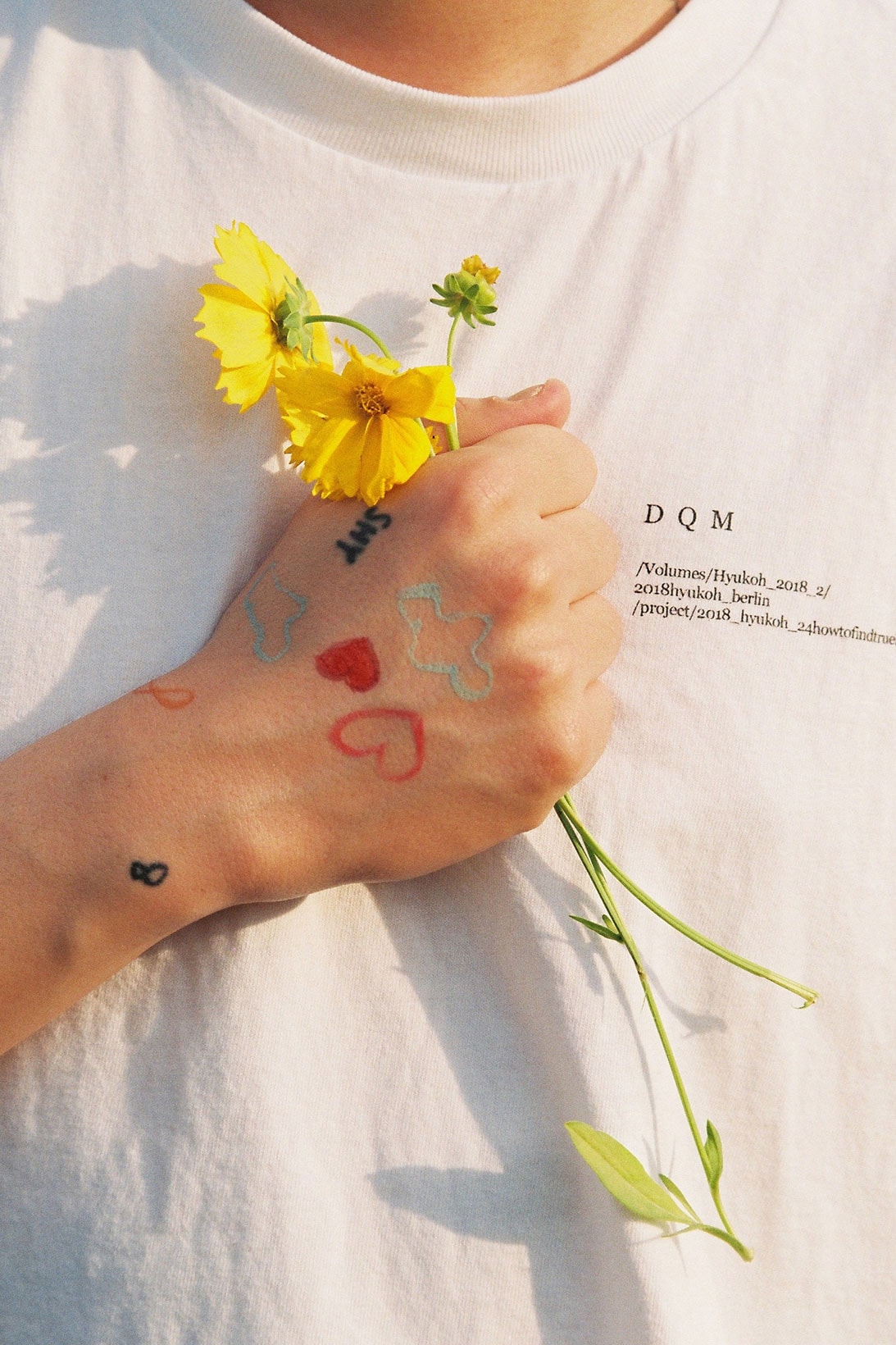 hyukoh uz eye opening liner summer campaign tattoos inclusivity men's beauty 