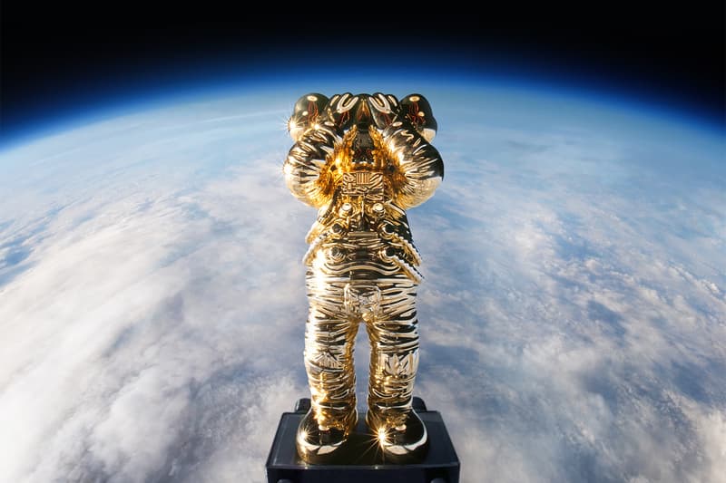 kaws holiday space allrightsreserved collaboration companion figure collectibles gold sculpture