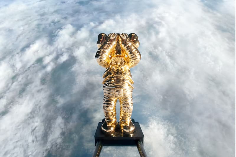kaws holiday space allrightsreserved collaboration companion figure collectibles gold sculpture