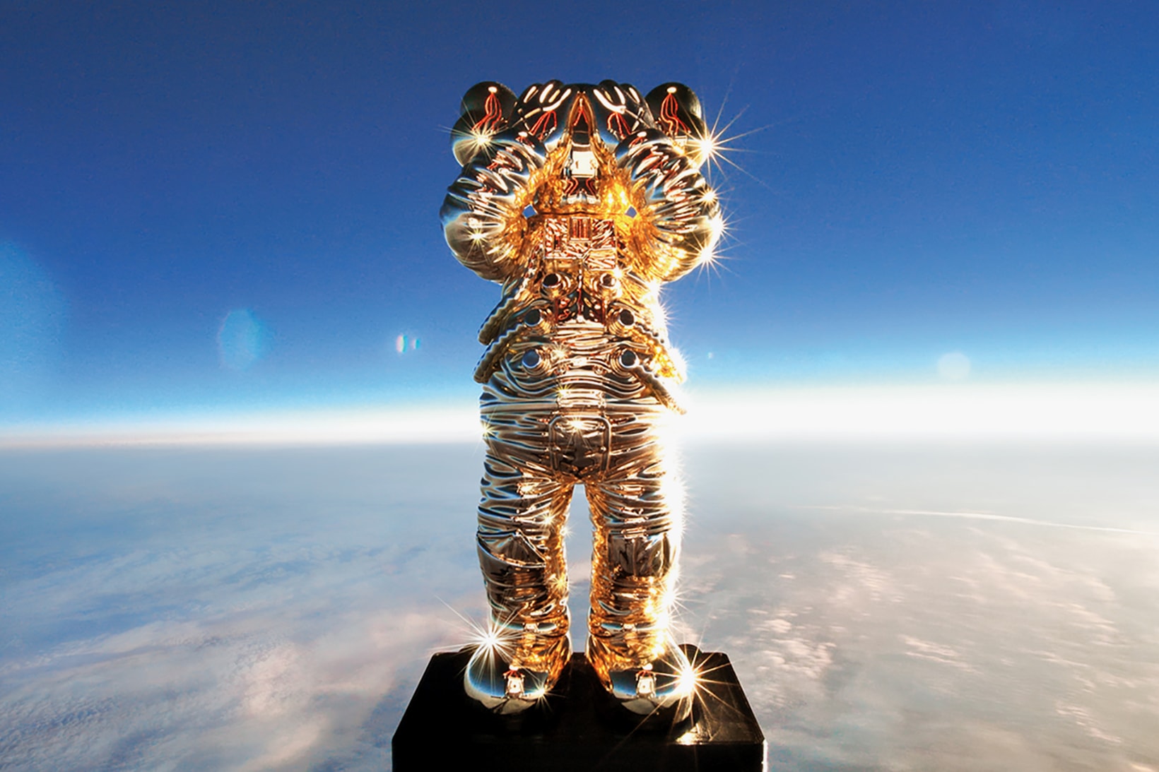 kaws holiday space allrightsreserved collaboration companion figure collectibles gold sculpture 