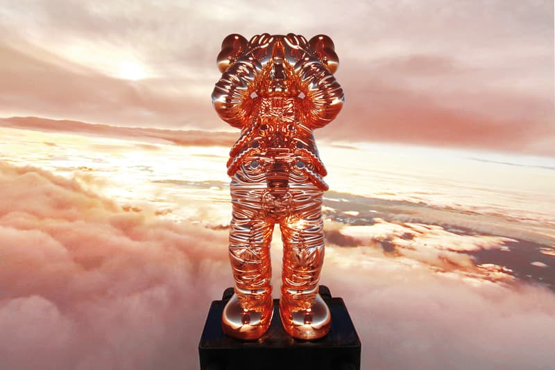 kaws holiday space allrightsreserved collaboration companion figure collectibles gold sculpture 