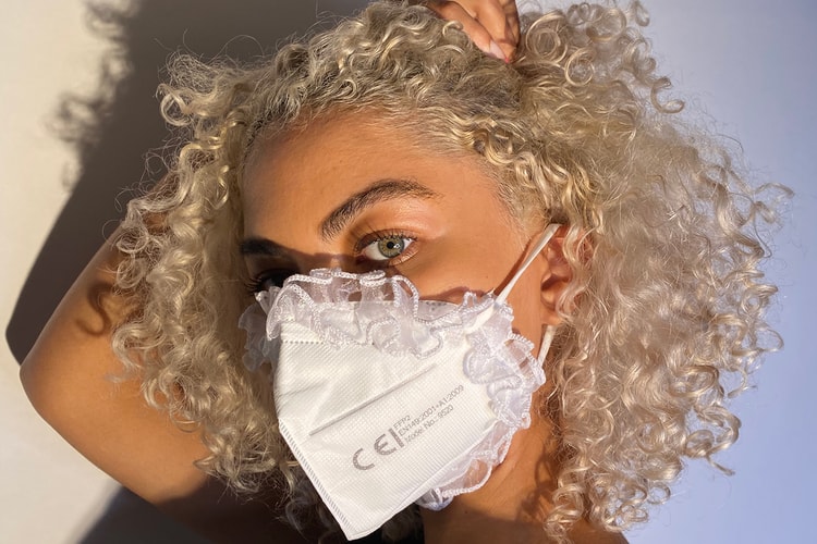 Tia Adeola Drops a New White CE Certified Ruffle Face Mask