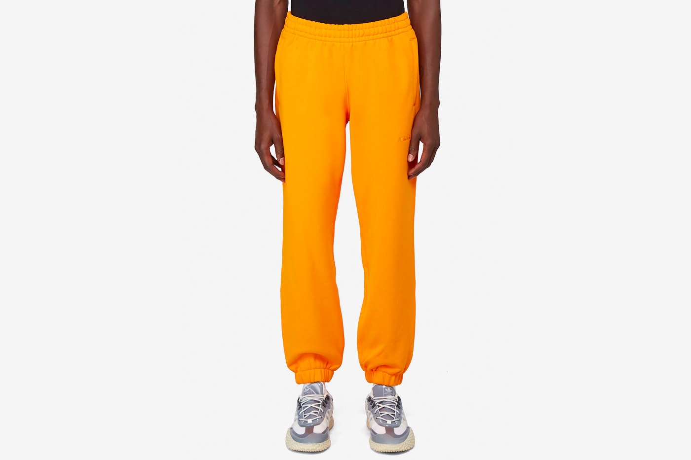 pharrell williams adidas originals basics line release hoodies t-shirts sweatpants slides slippers pink yellow