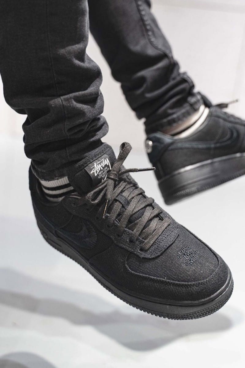 all black air force ones on feet