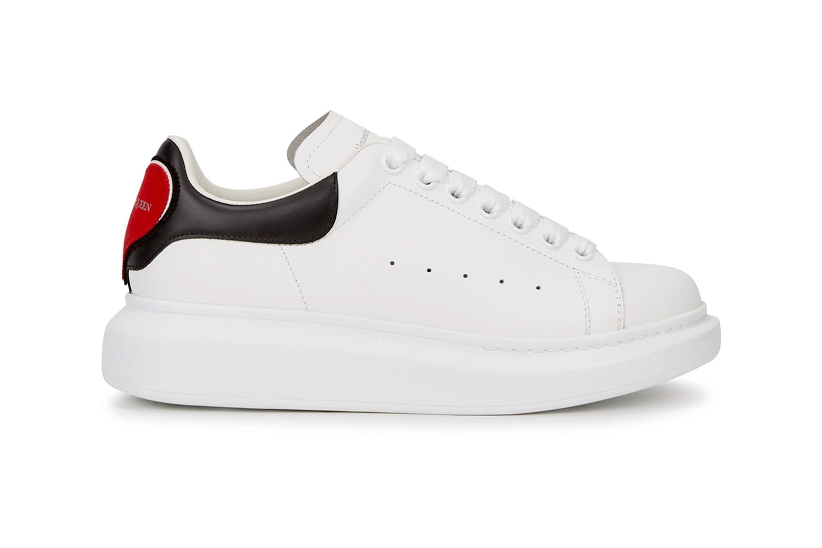 white sneakers with red hearts