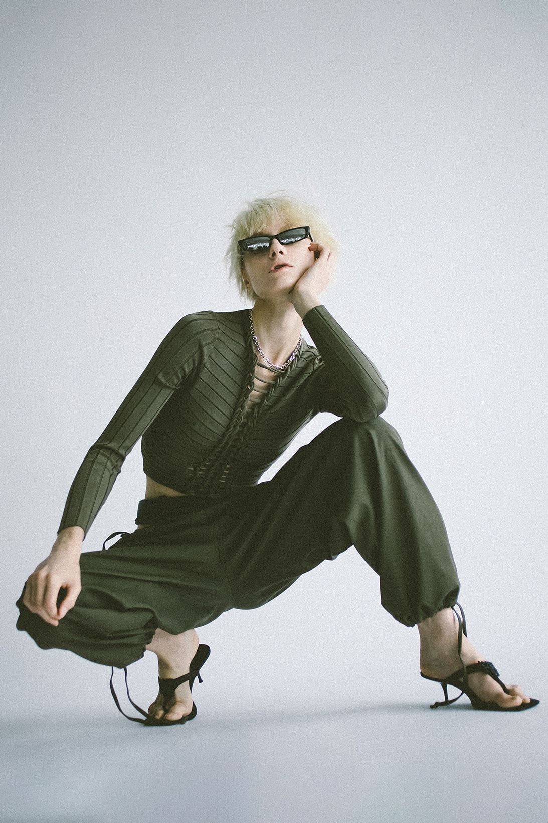 dion lee fall winter collection all black khaki fishnet trousers tops suits price release minimal