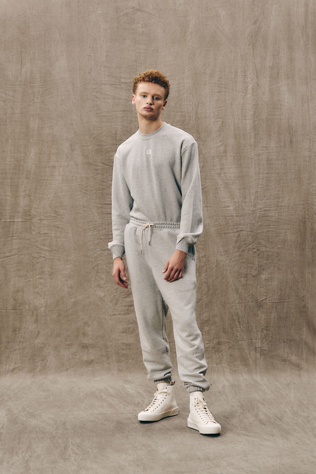 Here's your sign to invest in some Essentials. Fear of God Essentials Knit  Pullover Hoodie (SS21) + Fear of God Essentials Sweatpants (